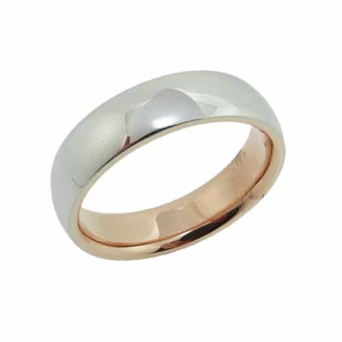 14 Karat white gold 6mm custom domed band with a rose gold sleeve. This ring is available in 14K/18K white, yellow or rose gold and platinum and in any width or finish.