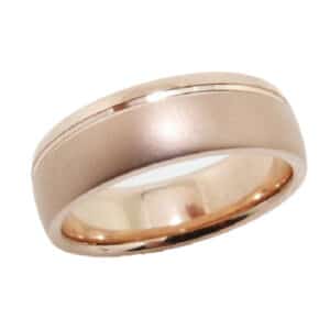 14 Karat rose gold 6.5mm domed band with a satin and polish finish. This ring is available in 14K/18K white, yellow or rose gold and platinum and in any width or finish.