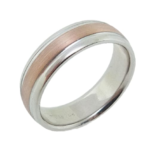 14 Karat rose & white gold 7mm domed rounded edge band with stainless texture rose gold centre and white gold polished edges. This ring is available in 14K/18K white, yellow or rose gold and platinum and in any width or finish.