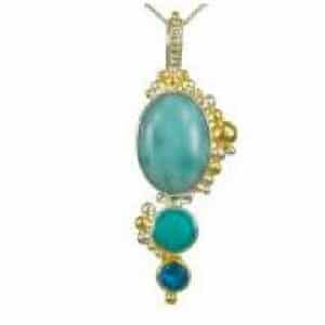 Sterling silver pendant bezel set with Larimar, Amazonite and teal topaz. This pendant is accented with 22 karat yellow gold vermeil and comes with a sterling silver chain.