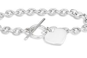 Sterling silver 7.25" silver toggle bracelet with a heart charm.