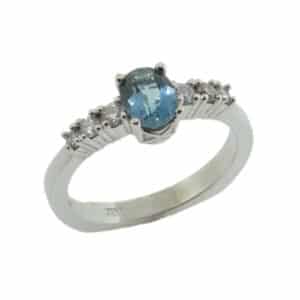 14 karat white gold ring set with a 0.485 carat aquamarine and accented with six round brilliant cut diamonds, 0.177 total carat weigh, G/H, SI. Aquamarine is the birthstone for March.