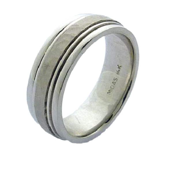 14K White gold men's 7.5mm band with stainless hammered centre and stripe detail. This ring is available in 14K/18K white, yellow or rose gold and platinum and in any width or finish.