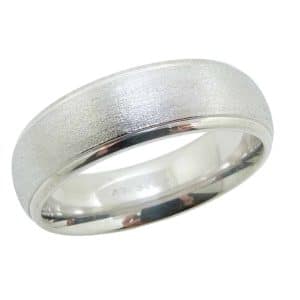 14K White gold domed men's 6.5 mm band with mezzy texture centre and step down polished edges.