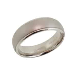 14K White gold domed men's 6.5 mm band with satin inlay and polished edges. This ring is available in 14K/18K white, yellow or rose gold and platinum and in any width or finish.