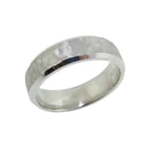 14K white gold men's beveled band with hammered texture and stone finish in the centre and polished edges. This ring is available in 14K/18K white, yellow or rose gold and platinum and in any width or finish.