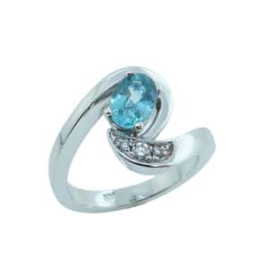 14k white gold ring set with a 1.30ct Blue Zircon and 3 round brilliant cut diamonds, 0.065cttw I/J, SI2/I1.