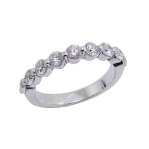14KW lady's band shared prong set with 9 round brilliant cut diamonds, 0.89cttw, G/H, VS-SI.