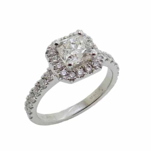 14K White gold engagement ring with set with a FireCushion Brilliant cut cushion cut diamond, 0.76ct, I, VS2, GIA graded. Accented with diamonds in the halo and on the band totaling 0.55 carats, G/H, SI1-VS1.