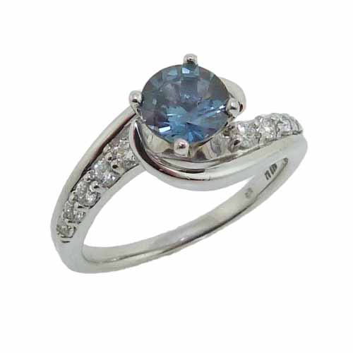 14K white gold ring set with a 1.08ct blue/green sapphire and accented with 10 very good cut, round brilliant cut diamonds, 0.27cttw, G/H, SI1-2.