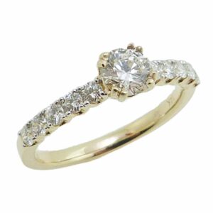 14K Yellow engagement ring claw set with a 0.43ct ideal cut round brilliant cut diamond, I, SI2 and claw set on the band with 10 round brilliant cut diamonds, 0.41cttw, H/I, SI1-2.