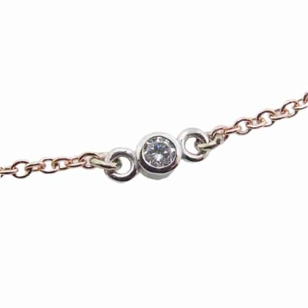 14K Rose gold 18" chain and pendant bezel set with a 0.065carat H/I, I1 round brilliant cut diamond.
