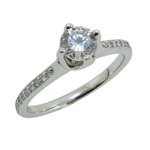 14K White gold solitaire engagement ring with an offset centre setting 0.5ct CZ and 20 round brilliant cut diamonds, 0.12cttw, G/H, SI. Priced without a center gemstone. Let us find you the perfect center that fits your tastes and budget!