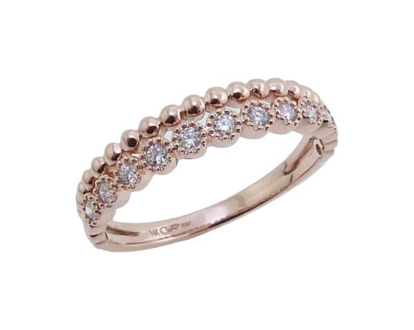 14K Rose gold stackable illusion band set with 0.16cttw, G/H, SI very good cut round brilliant cut diamonds.