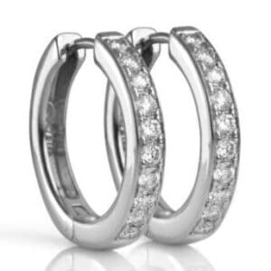 14k white gold hoop earrings set with 14 = 0.15cttw G/H, VS-SI round brilliant cut diamonds. 