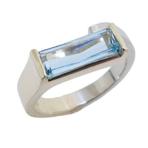 14 karat white and yellow gold ring set with a 1.31ct Aquamarine.  This beautiful ring is a custom Design by David.  Aquamarine is the birthstone for March.