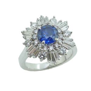 14K White gold custom lady's ring set with a 1.297ct blue sapphire and claw set into the double halo are 18 baguette cut diamonds, 0.60cttw G/H, VS, and 20 round brilliant cut diamonds, 0.60cttw F/G, SI1.