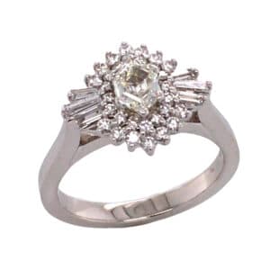 14KW custom halo engagement ring by Studio Tzela claw set with one 0.42ct hexagon step cut diamond, F/G, SI1, 6 baguettes, 0.174cttw, H, VS and 30 round brilliant cut diamonds, 0.22cttw, G/H, VVS-VS, vg-exc cut.