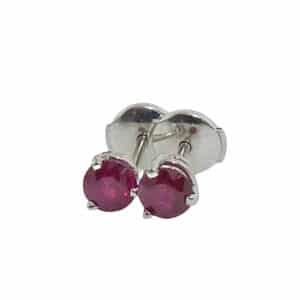 14K white gold stud earrings 3 prong set with 2 round rubies, 0.979cttw and featuring locking backs for extra security.