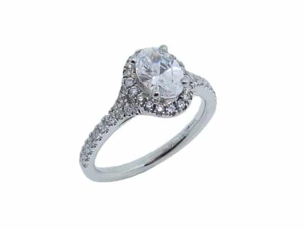 14 karat white split-shank oval halo engagement ring accented by 44 = 0.32cttw G/H, VS-SI, round brilliant cut diamonds. This unique design is a great alternative to a traditional halo ring. Priced without a center gemstone. Let us find you the perfect center that fits your tastes and budget!