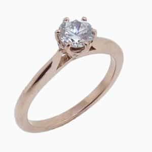 14K rose gold six claw solitaire engagement ring. Priced without a center gemstone. Let us find you the perfect center that fits your tastes and budget!