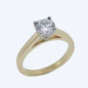 18K yellow and white gold solitaire engagement ring.