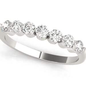 14k white gold band set with 7 = 0.899cttw very good cut, H/I, SI1-2, round brilliant cut diamonds