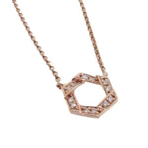 14k rose gold diamond geometric pendant set with 0.06ctw, G/H, SI, round brilliant cut diamonds.
