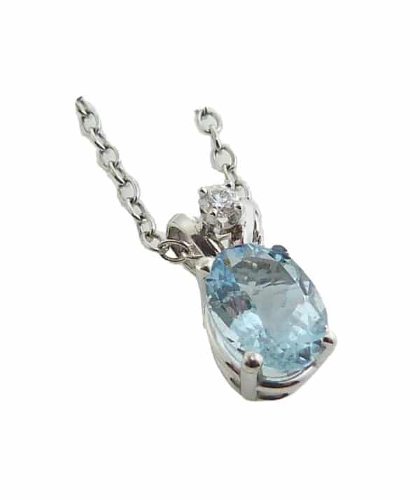 14K White gold pendant claw set with a 1.08ct oval aquamarine and 1 round brilliant cut diamond, 0.035ct, SI1-2.