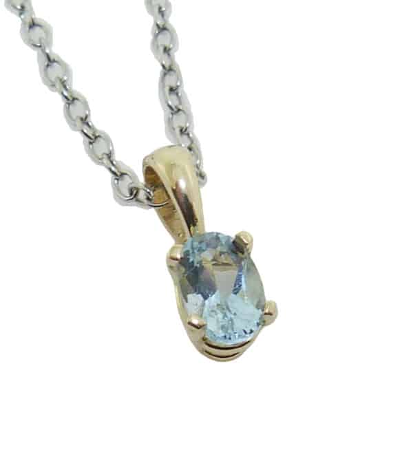 14 yellow gold halo pendant set with a 0.40ct aquamarine. Aquamarine is the birthstone for March.