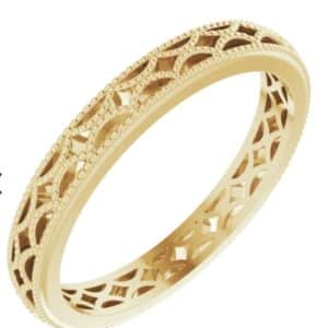Lady's 14K yellow gold patterned design band, 3 mm width, size 7.