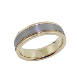 14K Yellow gold and tantalum men's band with soft polished edges and stainless texture on centre.