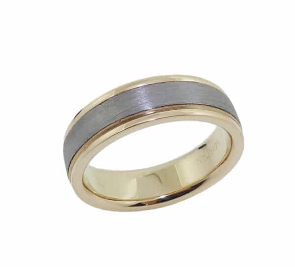 14K Yellow gold and tantalum men's band with soft polished edges and stainless texture on centre.