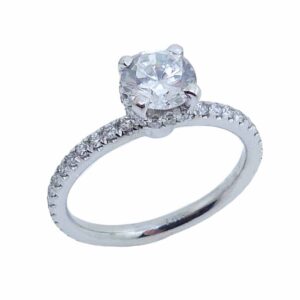 14K white gold solitaire engagement ring mounting with a hidden halo.  This ring mounting is set with 58 = 0.46cttw G/H, SI1 round brilliant cut diamonds.