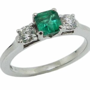 14K white gold ring set with a 0.47ct Asscher cut Emerald and accented with 2 ideal cut, I/J, SI2 round brilliant cut diamonds, 0.289cttw.