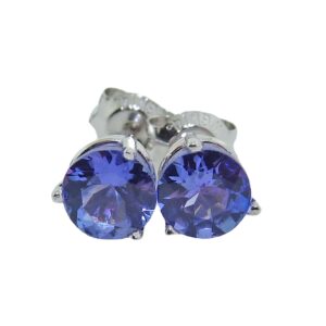 14K white gold 3 prong stud earrings set with 2 Tanzanite, 1.50cttw.