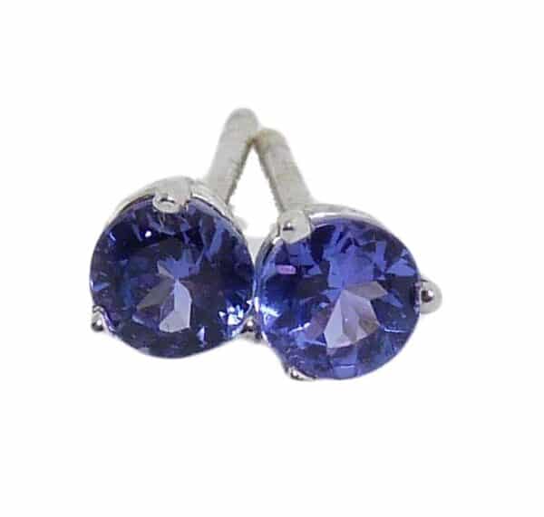 14K white gold three prong stud earrings set with Tanzanite, 0.59cttw.