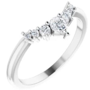 14K White gold diamond lady's contour band set with one pear shape diamond and six round brilliant cut diamonds, totalling 0.25 carats, G-H, SI2.