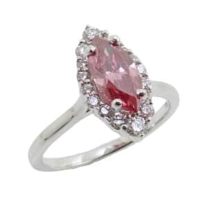 14K White gold halo engagement ring set with a 0.77 carat treated pink marquis diamond, SI1 and accented on the halo with 16 round brilliant cut diamonds, 0.28cttw, G/H, SI1.