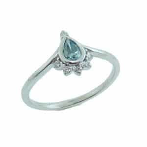 14K White gold engagement ring bezel set with pear shape 0.226ct blue diamond and accented with 6 single prong set round brilliant cut diamonds, 0.10 total carat weight, H, SI.