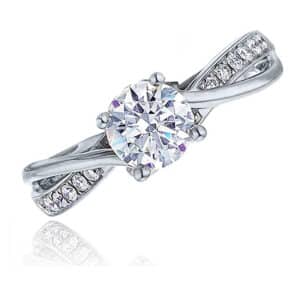 14K white gold Frederic Sage engagement ring set with a 0.75ct CZ and accented on the band with 14 pave set round brilliant cut diamonds, 0.11 total carat weight. Priced without a center gemstone. Let us find you the perfect center that fits your tastes and budget!