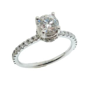 18K white gold hidden halo engagement ring set with an ideal cut 0.635ct, G, VS2, Hearts On Fire diamond and 20 Hearts On Fire diamonds, 0.185cttw, on the band and 14 Hearts On Fire diamonds, 0.084cttw, on the halo.