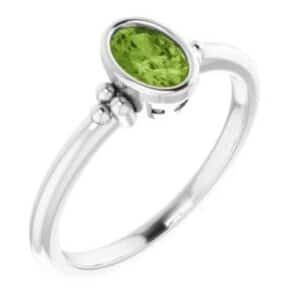 14K white gold ring bezel set with a 1.95ct Peridot.