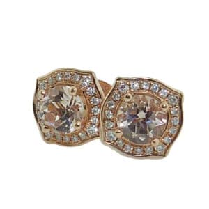 14K rose gold halo stud earrings set with 2 = 0.86cttw morganite and 0.13cttw G/H, SI round brilliant cut diamonds. 