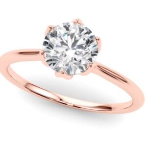 Six prong rose gold solitaire engagment ring.