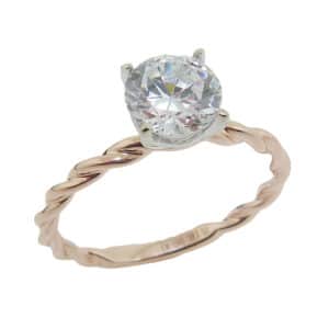 Lady's 14K rose and white gold twist band engagement ring set with 1 carat CZ in the center. Priced without a center gemstone. Let us find you the perfect center that fits your tastes and budget!