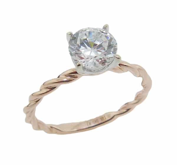 Lady's 14K rose and white gold twist band engagement ring set with 1 carat CZ in the center. Priced without a center gemstone. Let us find you the perfect center that fits your tastes and budget!