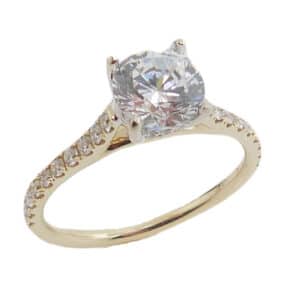 Lady's 14K yellow and white gold ring set with 1 carat CZ and accented on the band and in the hidden halo with twenty-six claw set, G-H, SI1-2 round brilliant cut diamonds, totaling 0.28 carats. Priced without a center gemstone. Let us find you the perfect center that fits your tastes and budget!