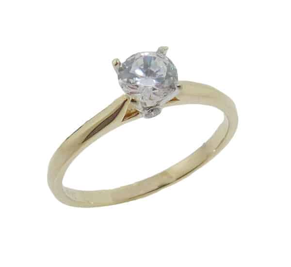 Lady's 14K yellow and white gold engagement ring set with 1/2 carat CZ in the center and accented on the profile with two bezel set G-H, SI1-2, round brilliant cut diamonds totaling 0.02 carats. Priced without a center gemstone. Let us find you the perfect center that fits your tastes and budget!