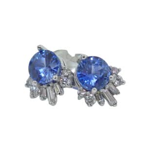 14K white gold earrings set with 2 = 1.91cttw sapphires and accented with 14 = 0.279cttw diamonds. 